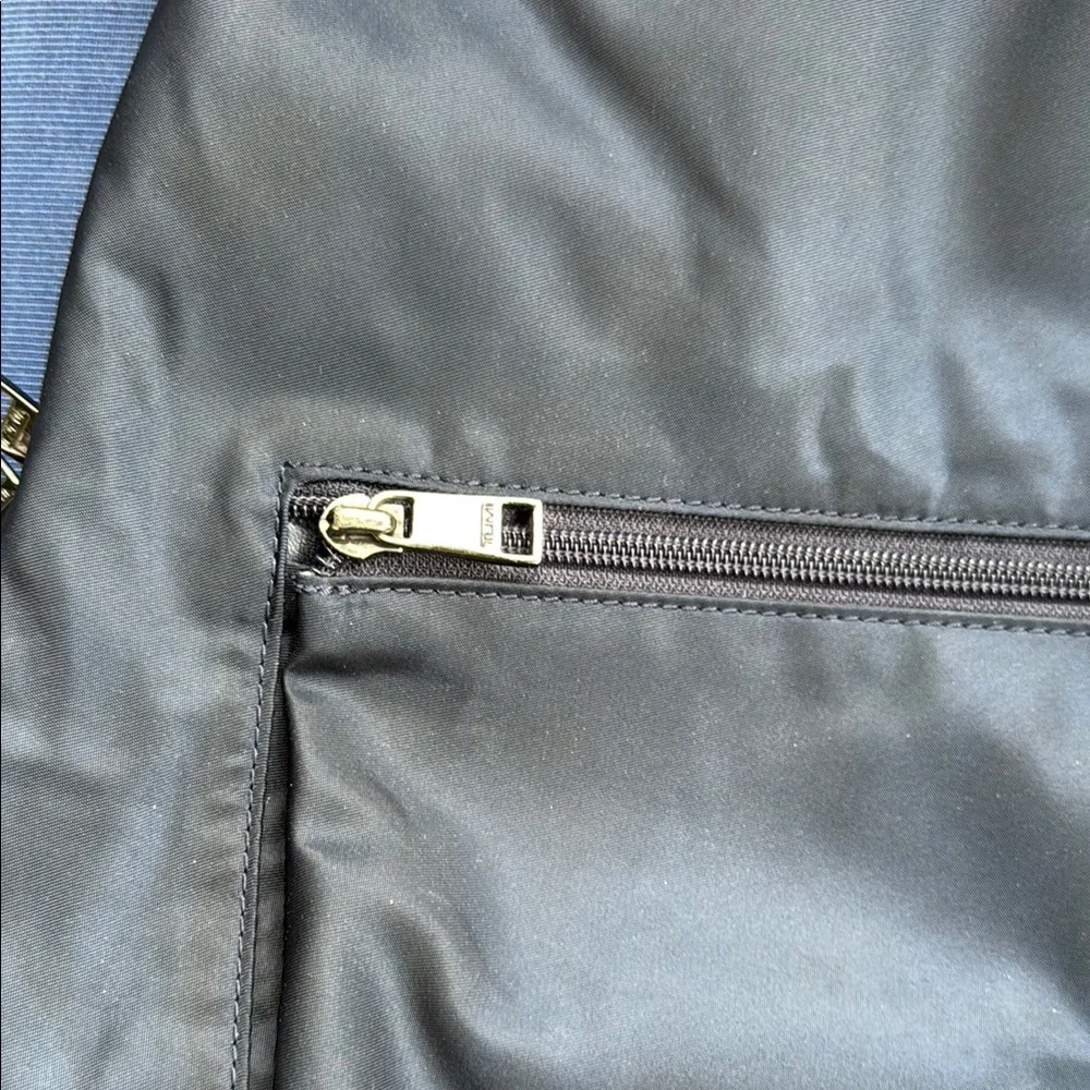 Tumi Black Backpack with Minimalist Design and Durable Material